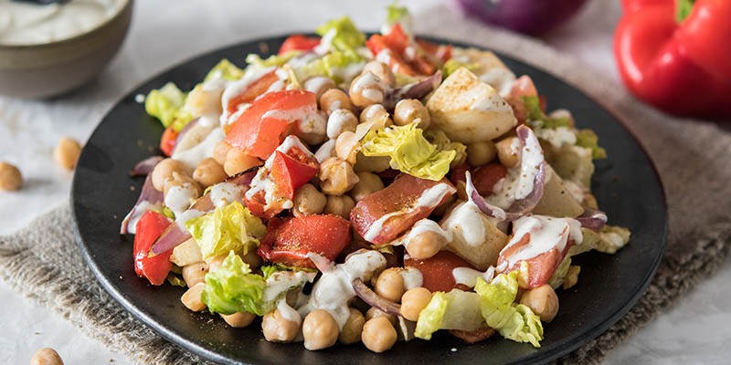 Salade de pois chiches, légumes rôtis et cumin Salade de pois chiches, légumes rôtis et cumin
